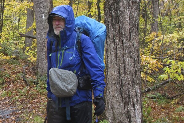 Artist hikes length of Vermont painting along the way AP News